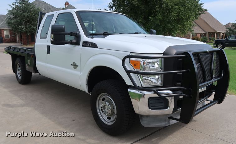 image for item FE9748 2011 Ford F250 Super Duty XL SuperCab flatbed pickup truck