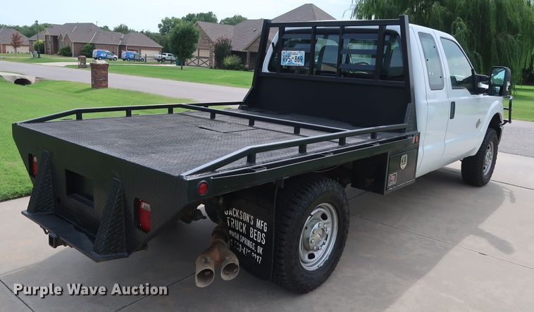 image for item FE9748 2011 Ford F250 Super Duty XL SuperCab flatbed pickup truck