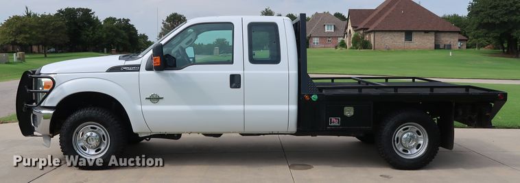 image for item FE9748 2011 Ford F250 Super Duty XL SuperCab flatbed pickup truck