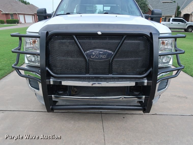 image for item FE9748 2011 Ford F250 Super Duty XL SuperCab flatbed pickup truck