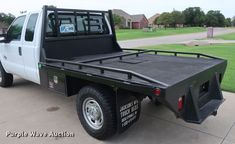 image for item FE9748 2011 Ford F250 Super Duty XL SuperCab flatbed pickup truck