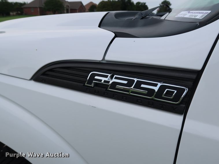 image for item FE9748 2011 Ford F250 Super Duty XL SuperCab flatbed pickup truck