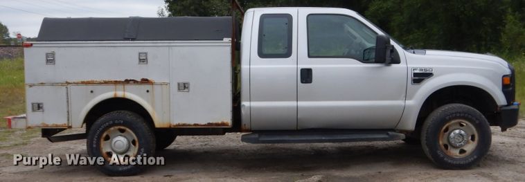 image for item FU9423 2009 Ford F350 Super Duty SuperCab utility bed pickup truck