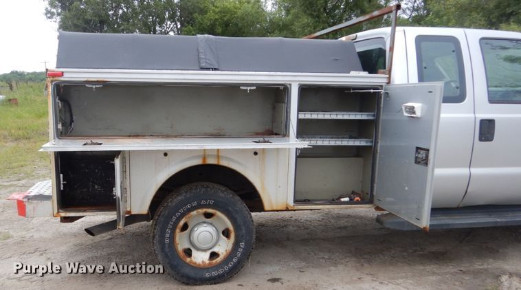 image for item FU9423 2009 Ford F350 Super Duty SuperCab utility bed pickup truck