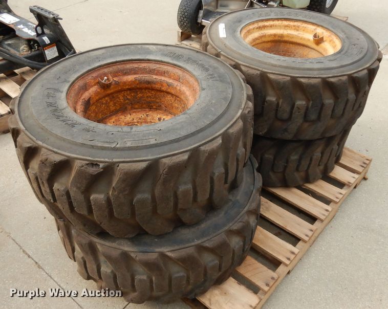 image for item GG9104 (4) 12-16.5 tires and wheels