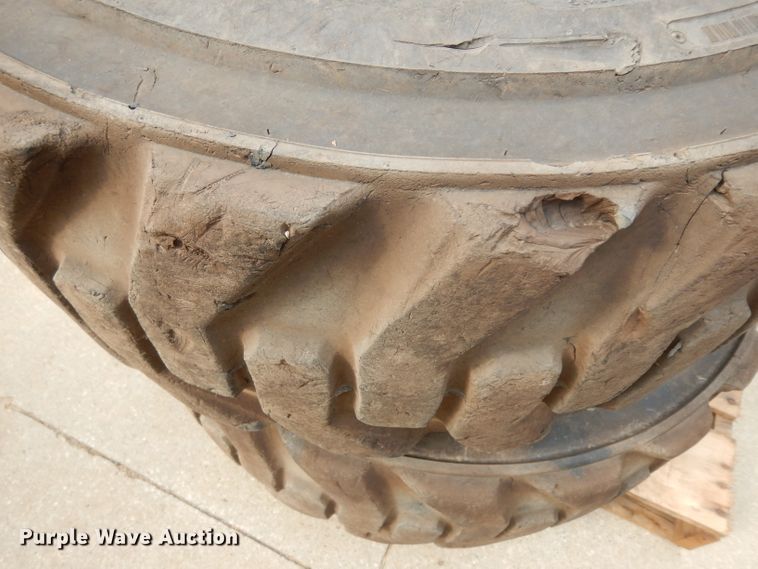 image for item GG9104 (4) 12-16.5 tires and wheels