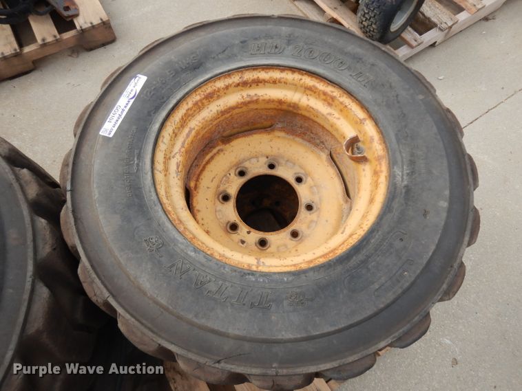 image for item GG9104 (4) 12-16.5 tires and wheels