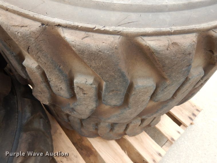 image for item GG9104 (4) 12-16.5 tires and wheels