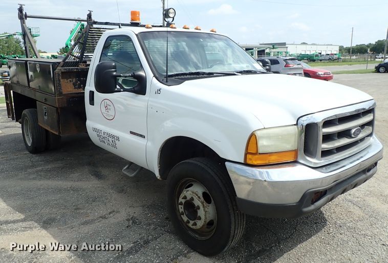 image for item DE0949 1999 Ford F550 Super Duty flatbed truck