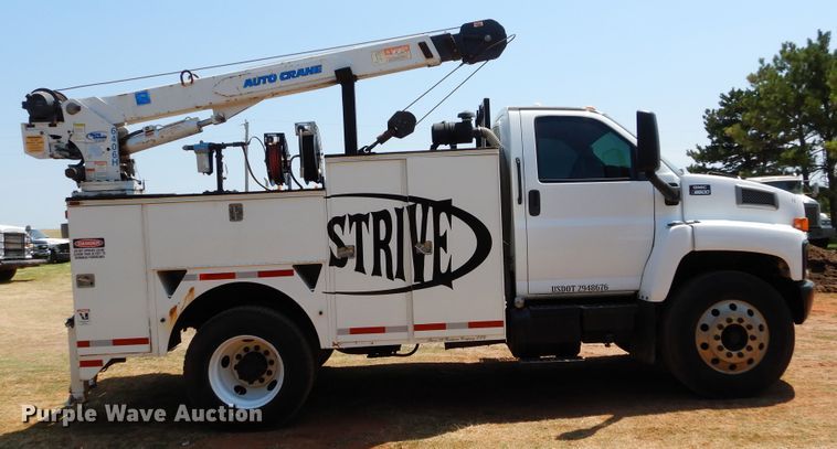 image for item DG4102 2006 GMC C8500 utility truck with crane
