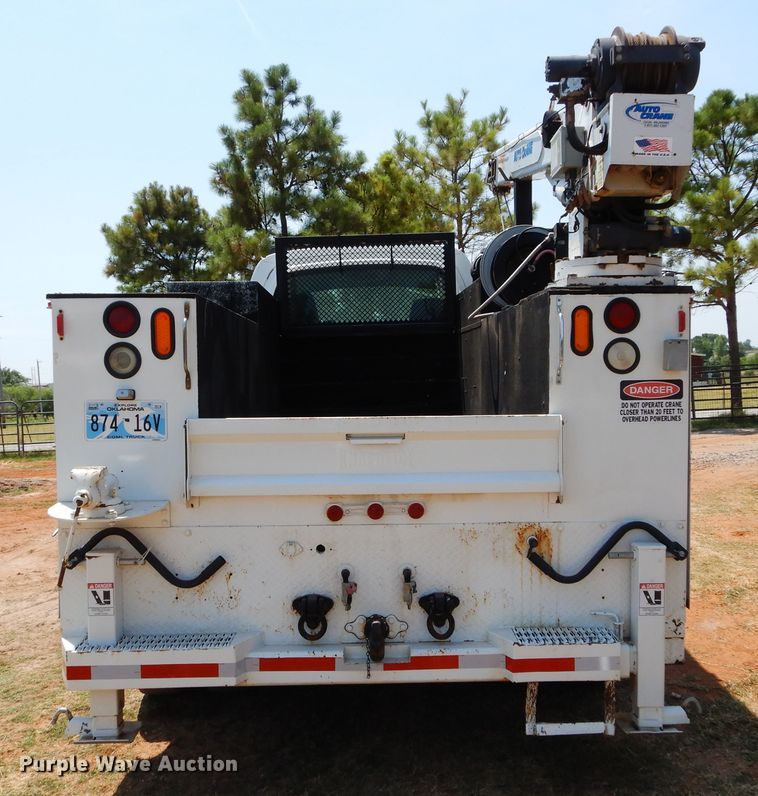 image for item DG4102 2006 GMC C8500 utility truck with crane