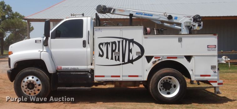 image for item DG4102 2006 GMC C8500 utility truck with crane