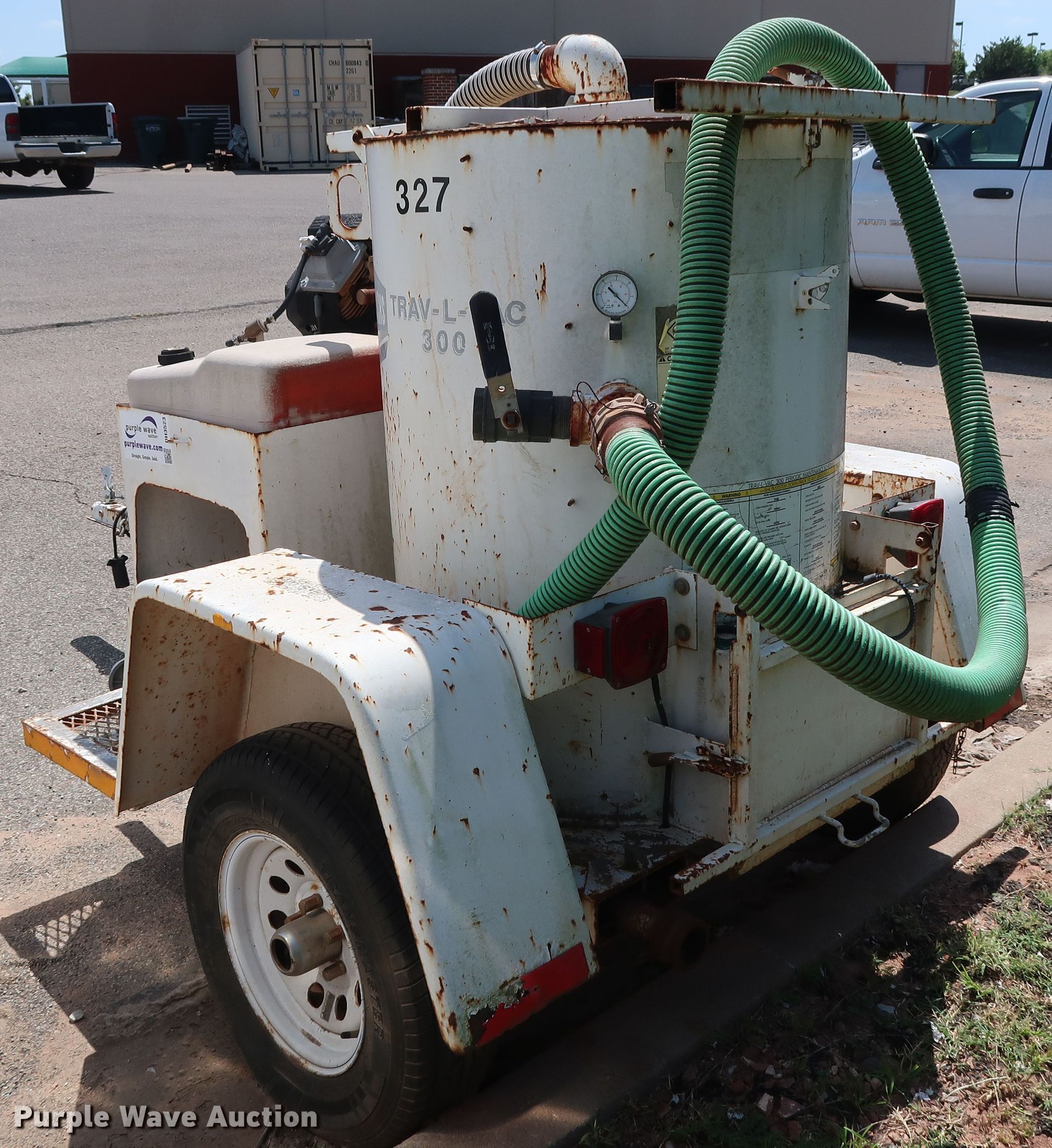 Wachs TravLVac 300 vacuum in Edmond, OK Item DH3523 sold Purple Wave