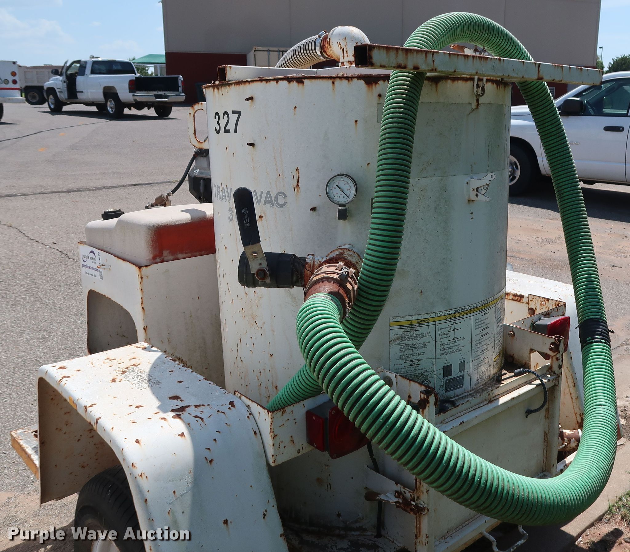 Wachs TravLVac 300 vacuum in Edmond, OK Item DH3523 sold Purple Wave