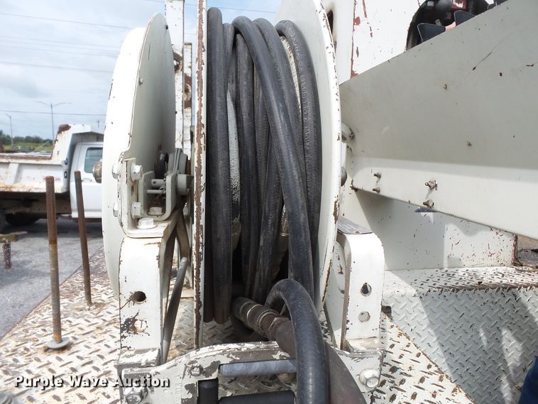 image for item DE7939 1995 Ford F700 digger derrick truck