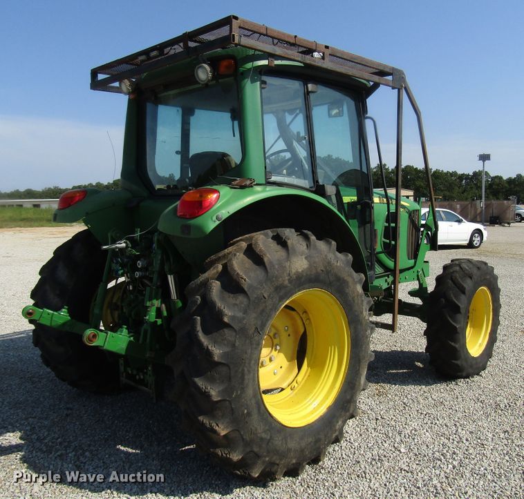 image for item DG8044 2009 John Deere 6430 MFWD tractor