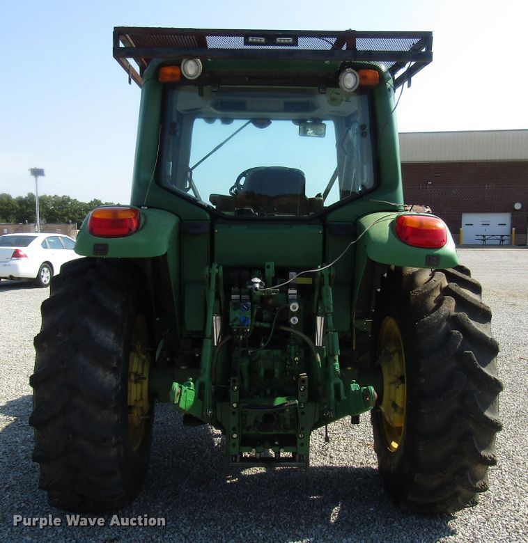 image for item DG8044 2009 John Deere 6430 MFWD tractor