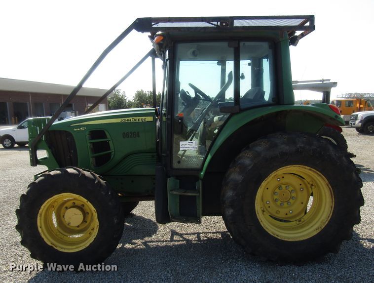 image for item DG8044 2009 John Deere 6430 MFWD tractor