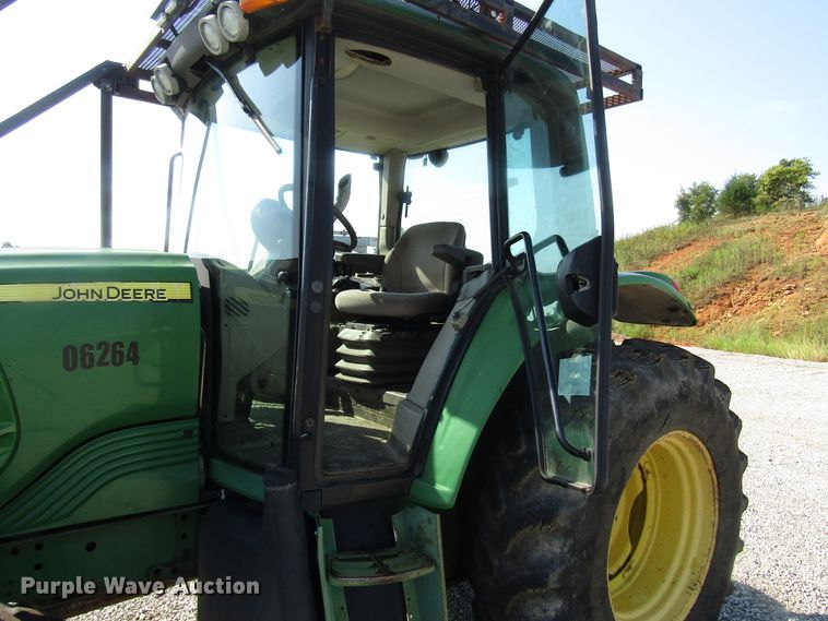 image for item DG8044 2009 John Deere 6430 MFWD tractor