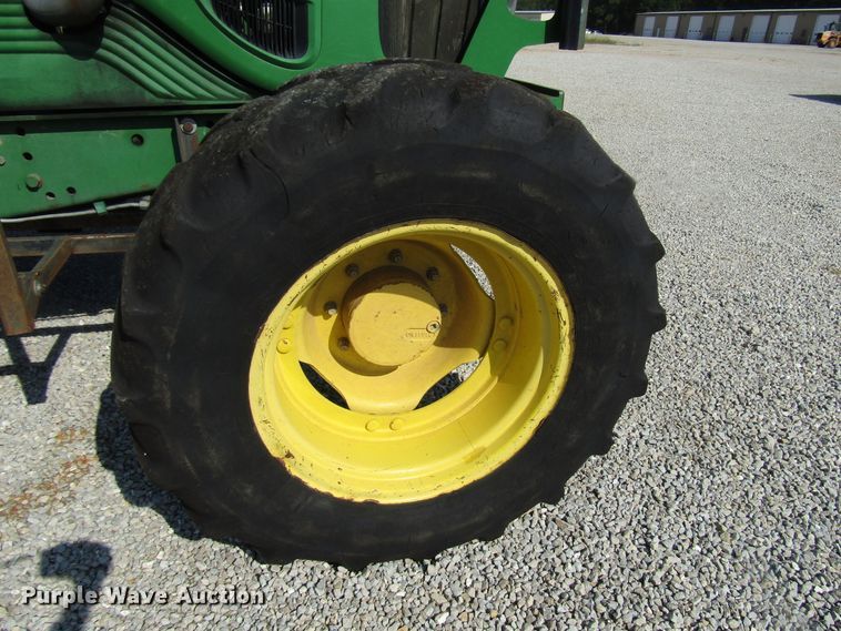image for item DG8044 2009 John Deere 6430 MFWD tractor