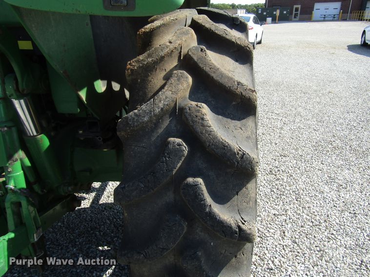 image for item DG8044 2009 John Deere 6430 MFWD tractor