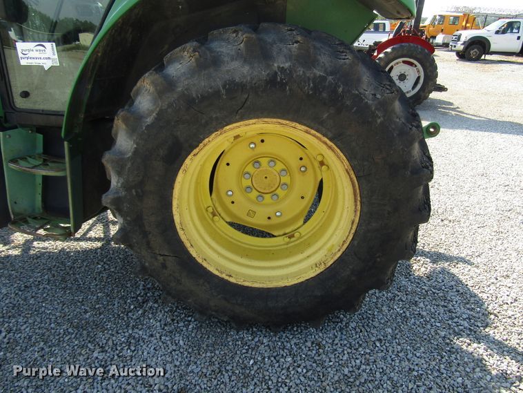 image for item DG8044 2009 John Deere 6430 MFWD tractor