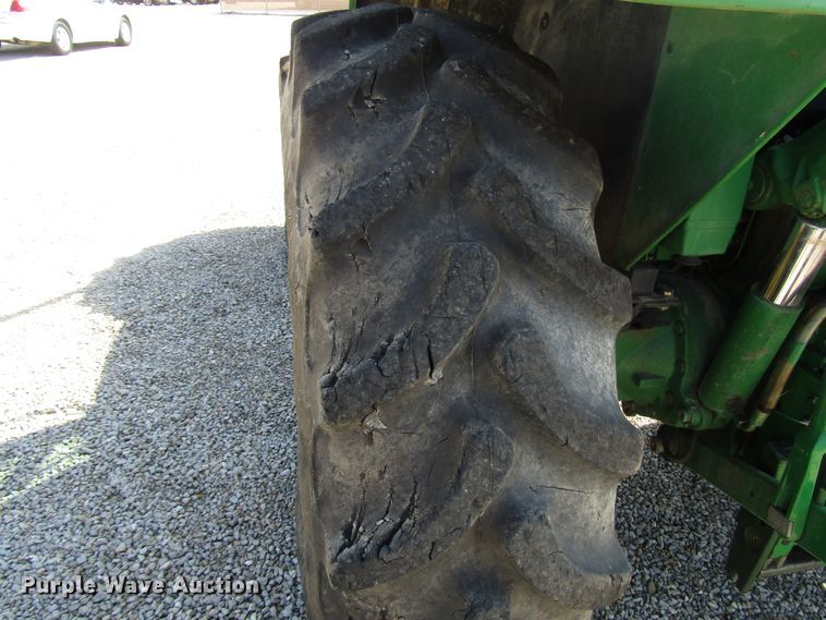 image for item DG8044 2009 John Deere 6430 MFWD tractor