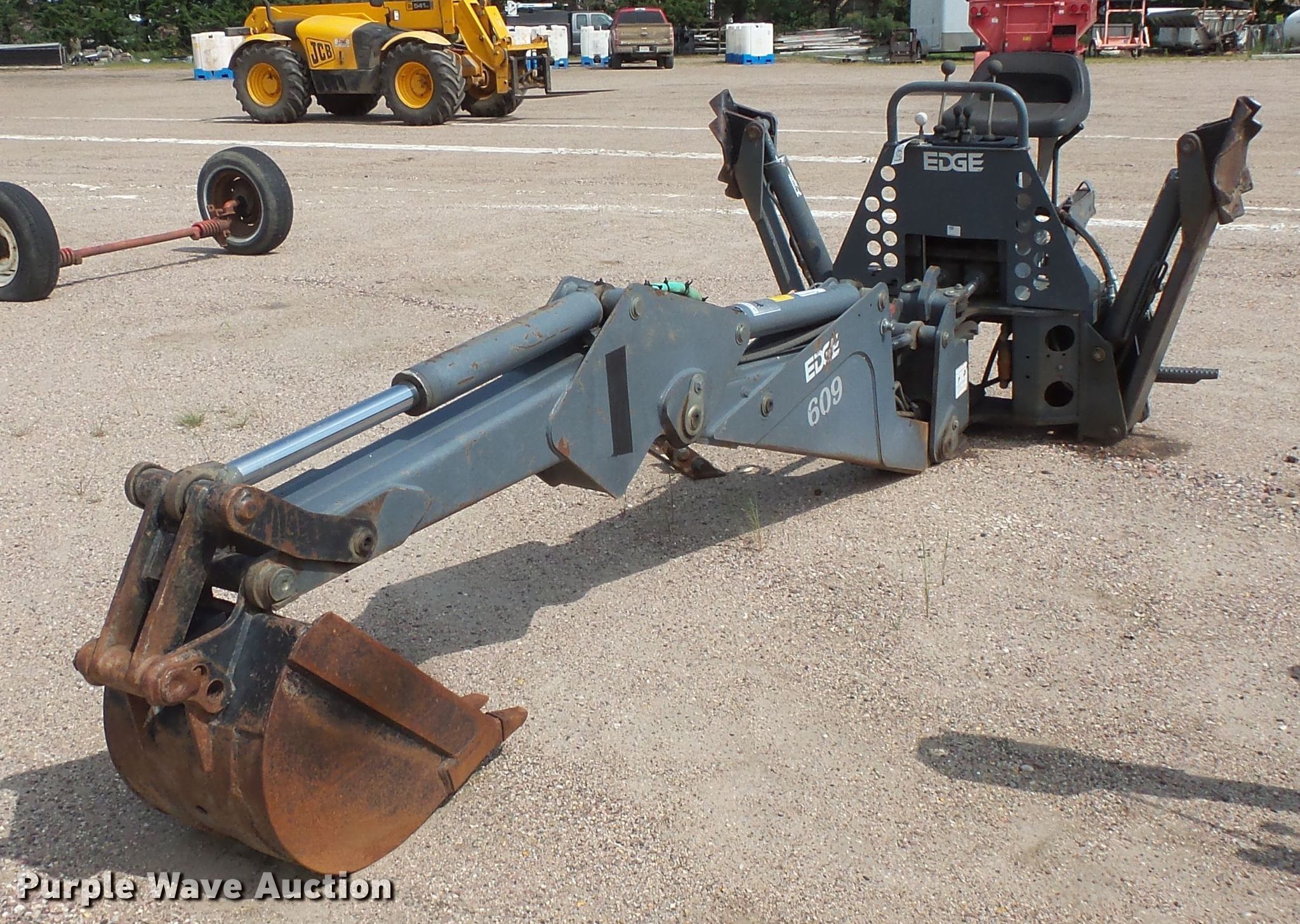 Bradco BH609 skid steer backhoe in Mitchell, SD Item FU9329 sold