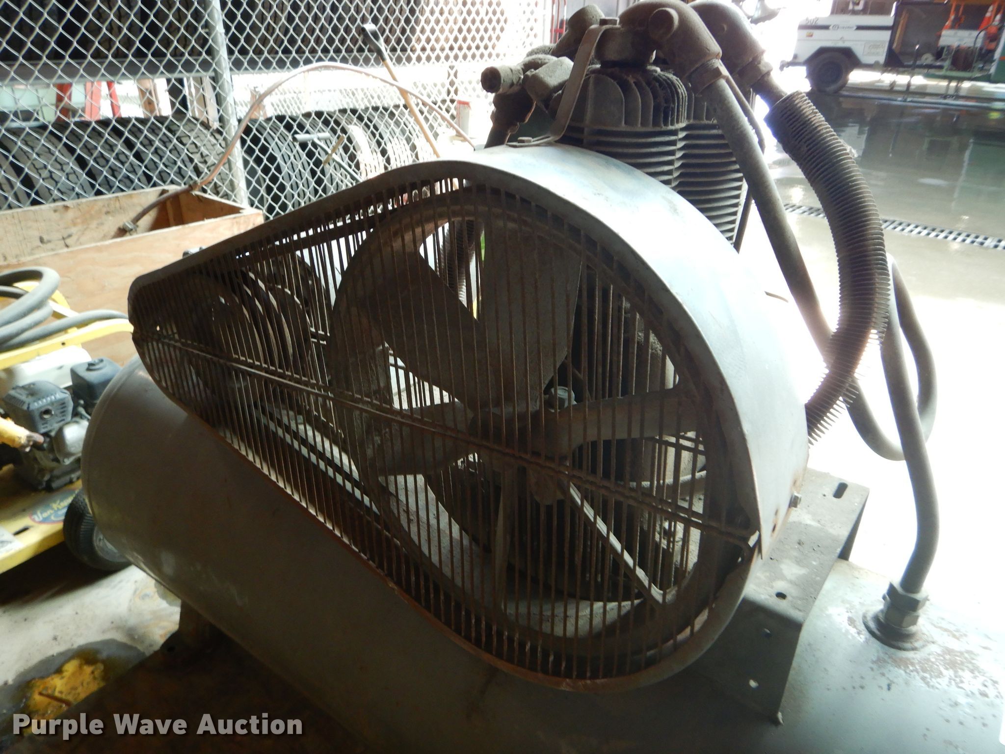 Air compressor in Kansas City, KS Item GJ9827 sold Purple Wave