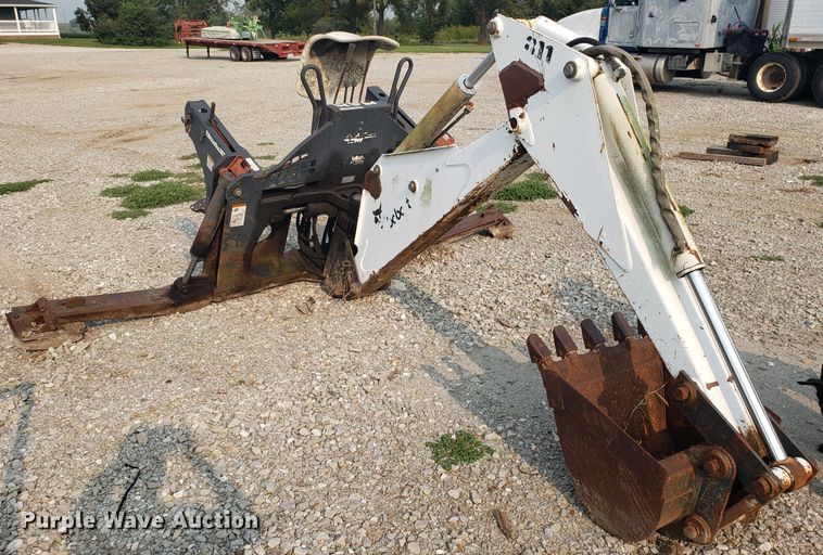 image for item GF9250 Bobcat 811 skid steer backhoe attachment