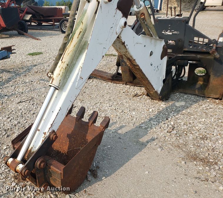 image for item GF9250 Bobcat 811 skid steer backhoe attachment