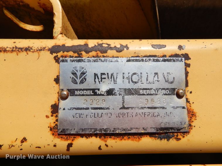 image for item GG9139 1997 New Holland 2550 windrower