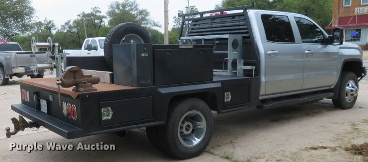 image for item G1937 2017 GMC Sierra 3500HD Crew Cab flatbed pickup truck