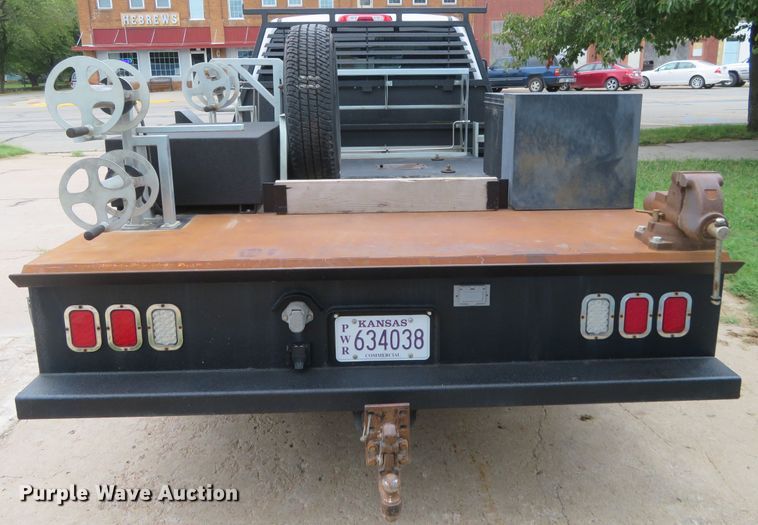 image for item G1937 2017 GMC Sierra 3500HD Crew Cab flatbed pickup truck