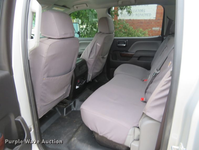 image for item G1937 2017 GMC Sierra 3500HD Crew Cab flatbed pickup truck