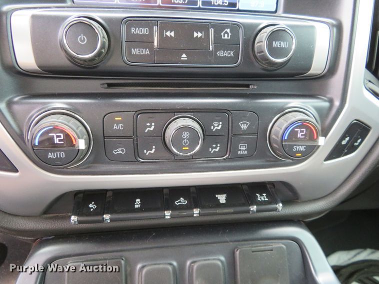 image for item G1937 2017 GMC Sierra 3500HD Crew Cab flatbed pickup truck