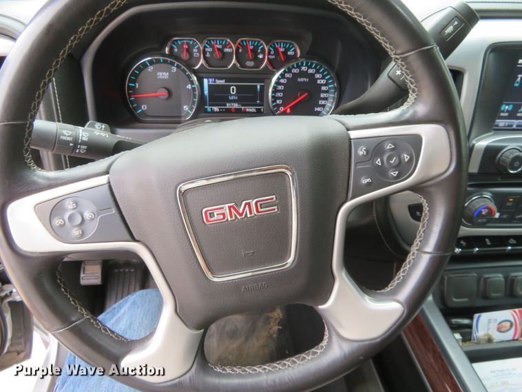 image for item G1937 2017 GMC Sierra 3500HD Crew Cab flatbed pickup truck