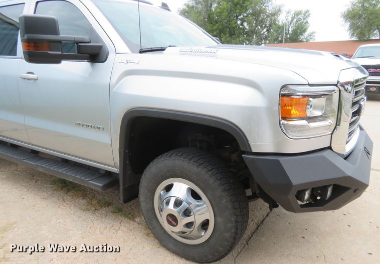 image for item G1937 2017 GMC Sierra 3500HD Crew Cab flatbed pickup truck