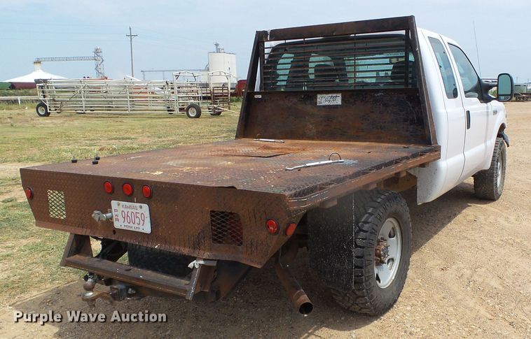 image for item DC5065 2007 Ford F250 Super Duty XL SuperCab flatbed pickup truck