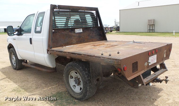 image for item DC5065 2007 Ford F250 Super Duty XL SuperCab flatbed pickup truck
