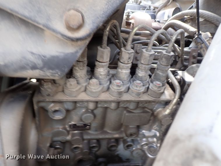 image for item DE0955 1995 Ford F800 flatbed truck