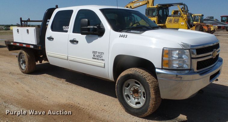 image for item DG0185 2014 Chevrolet Silverado 3500HD Crew Cab flatbed pickup truck
