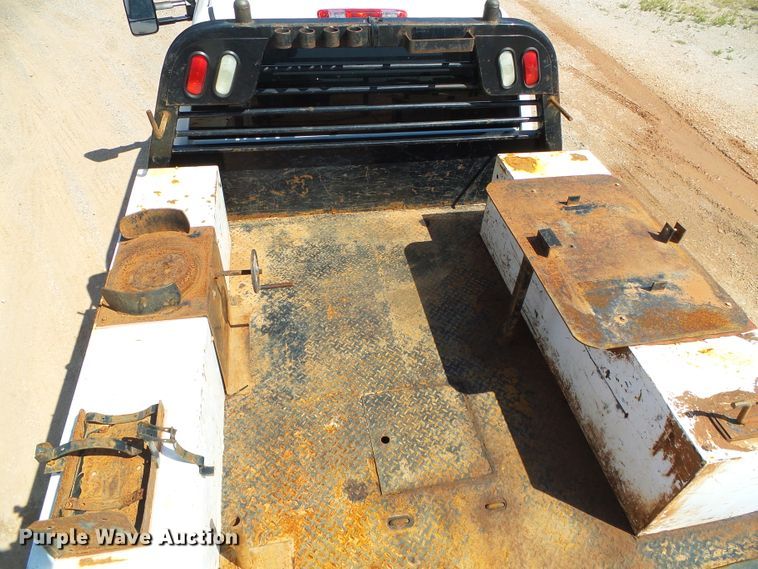 image for item DG0185 2014 Chevrolet Silverado 3500HD Crew Cab flatbed pickup truck