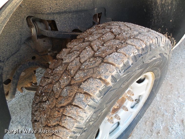 image for item DG0185 2014 Chevrolet Silverado 3500HD Crew Cab flatbed pickup truck