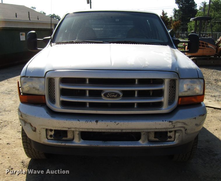 image for item DG1345 2001 Ford F350 Super Duty Crew Cab flatbed pickup truck