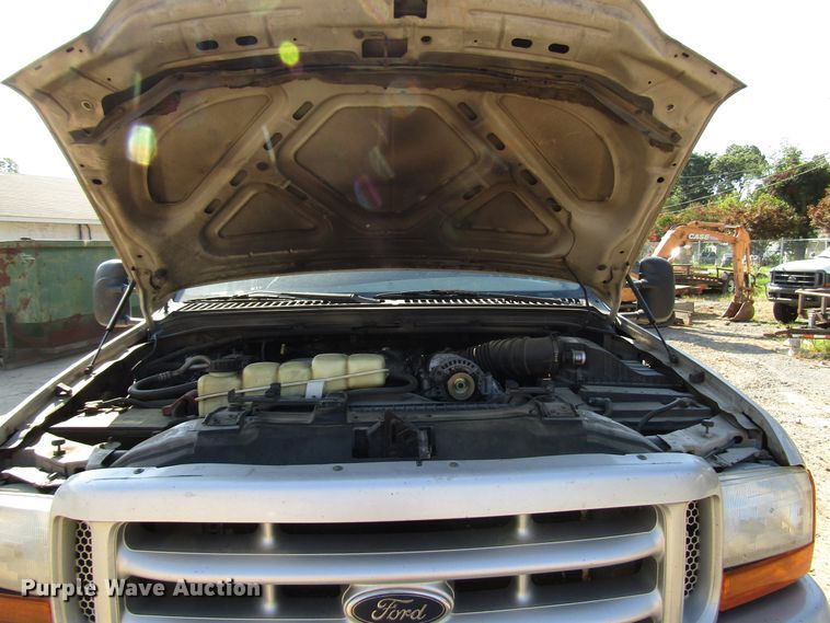 image for item DG1345 2001 Ford F350 Super Duty Crew Cab flatbed pickup truck