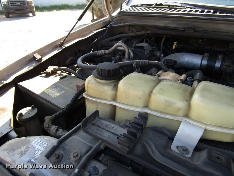 image for item DG1345 2001 Ford F350 Super Duty Crew Cab flatbed pickup truck