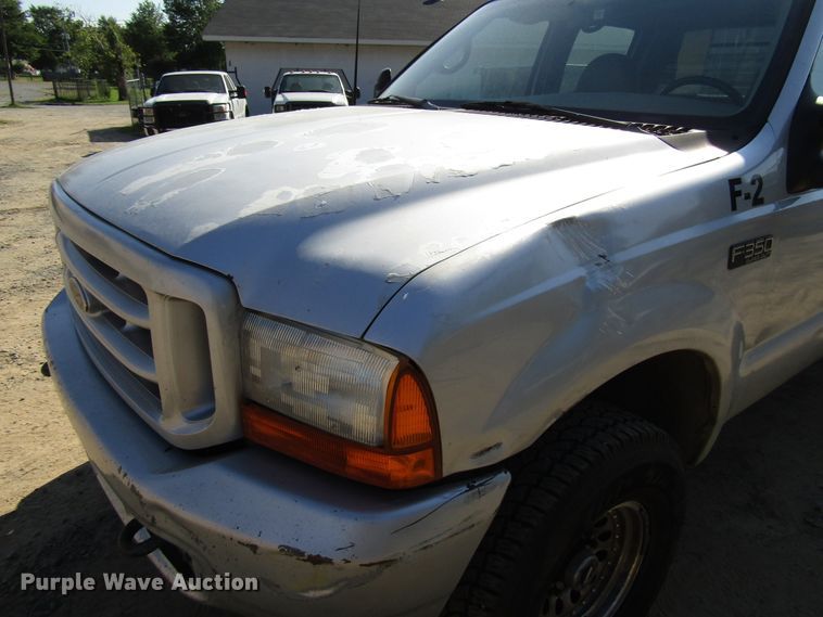 image for item DG1345 2001 Ford F350 Super Duty Crew Cab flatbed pickup truck