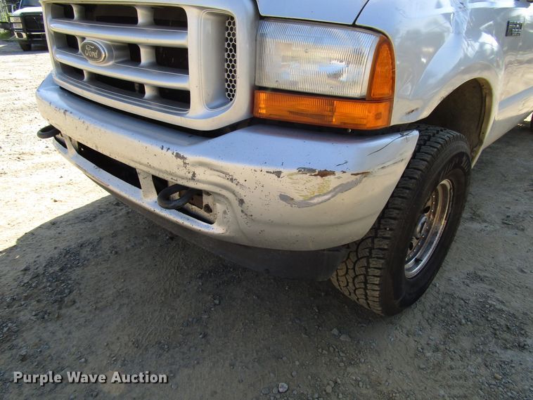 image for item DG1345 2001 Ford F350 Super Duty Crew Cab flatbed pickup truck