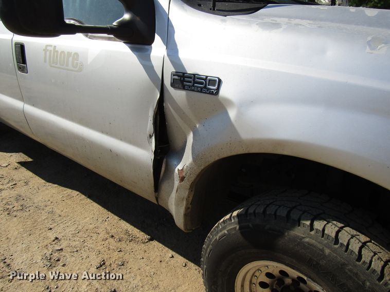 image for item DG1345 2001 Ford F350 Super Duty Crew Cab flatbed pickup truck